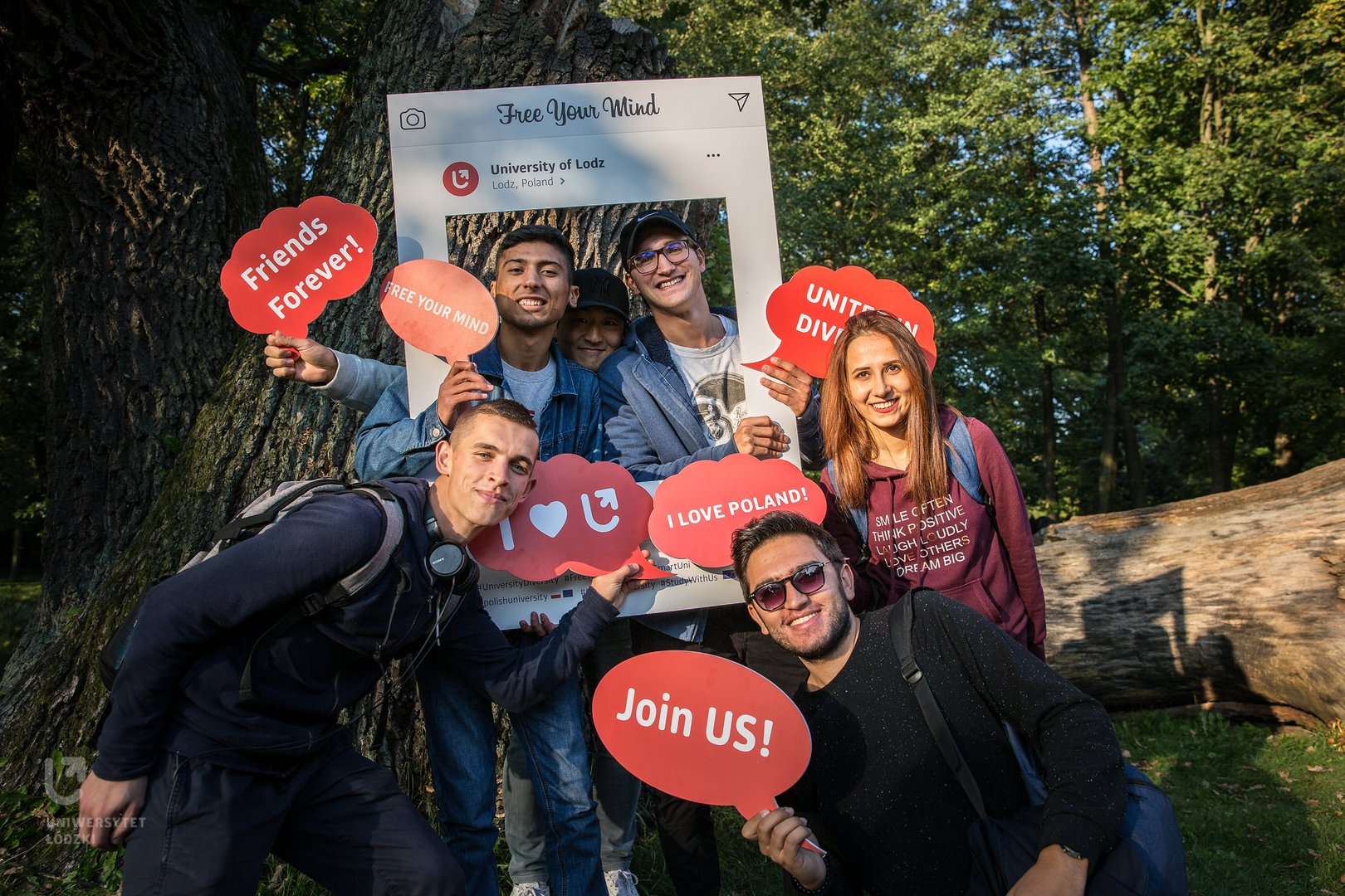 New University of Lodz students posing happily for a picture.