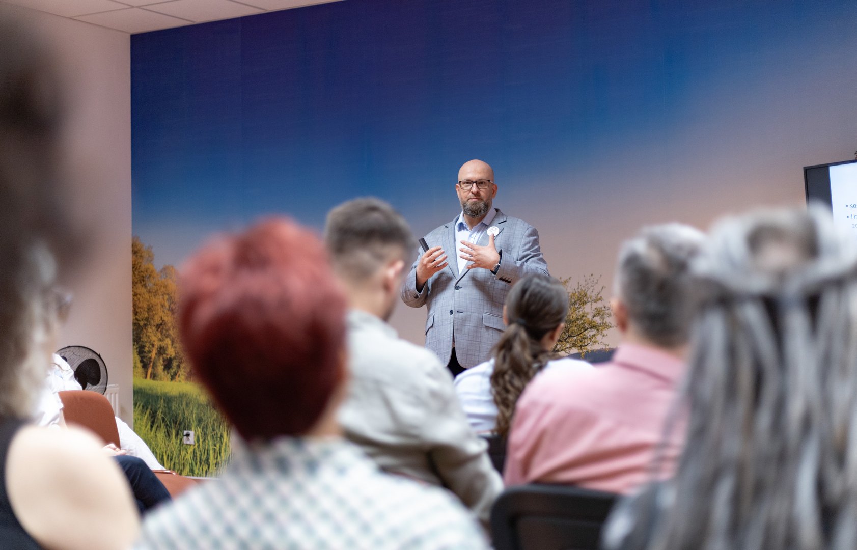A man delivering a lecture