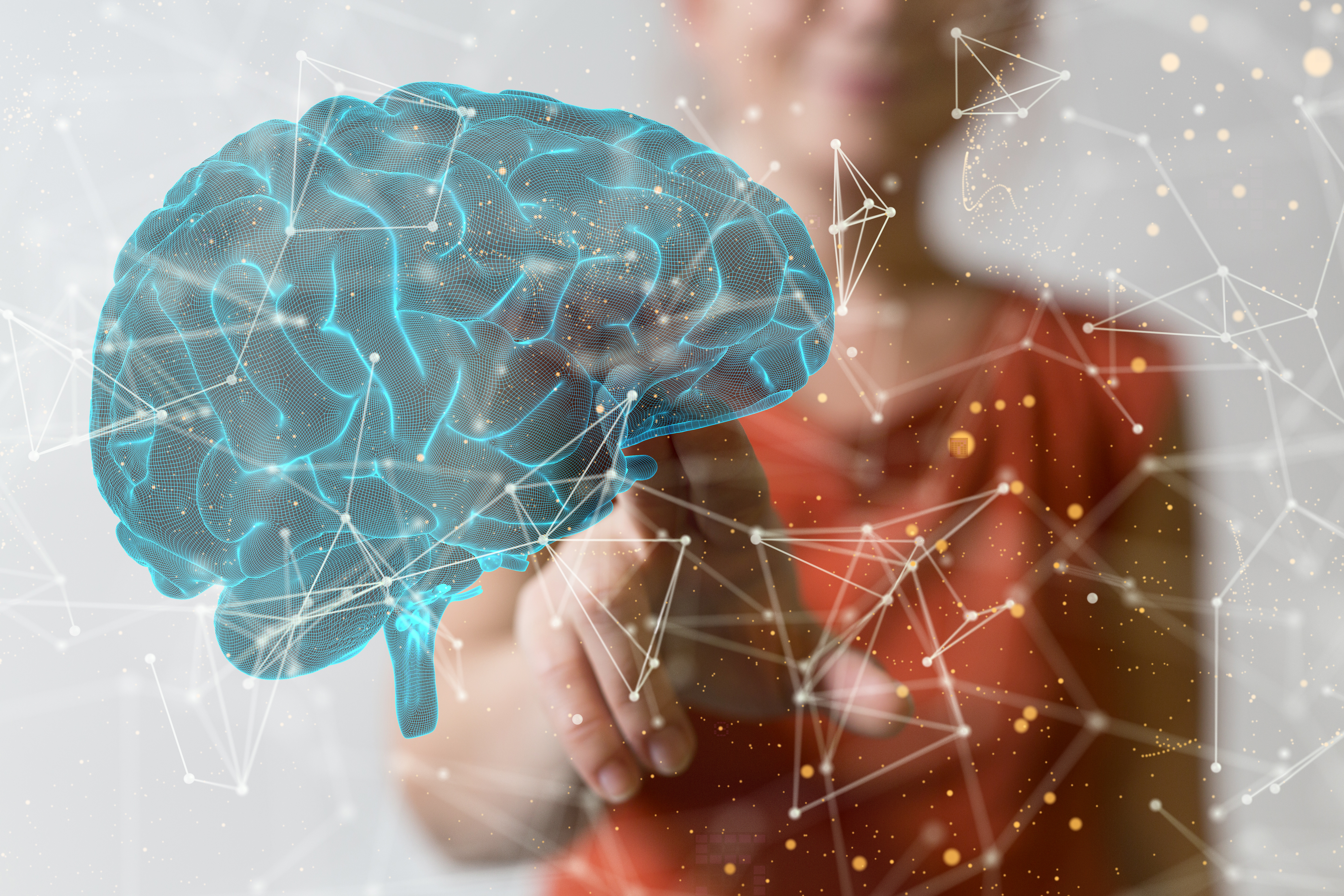 Animacja mózgu i sieci powiązań, w tle kobieta wyciąga rękę