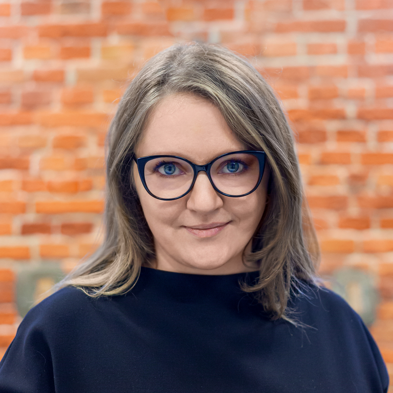 a portrait photo of Dr Małgorzata Grodzicka-Kowalczyk 