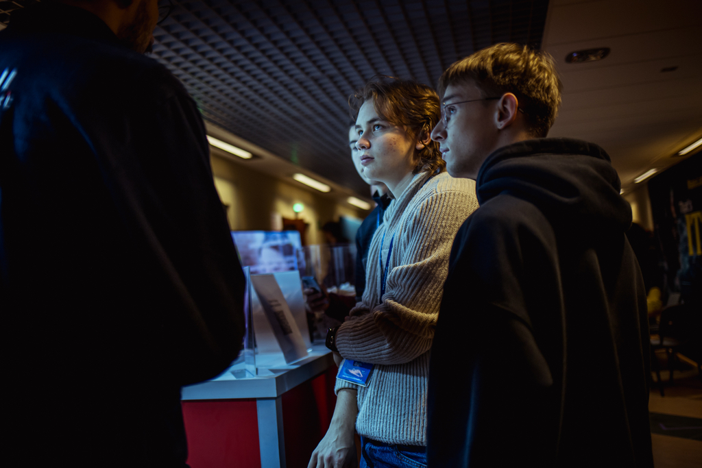 participants of the event visiting exhibitors' stands