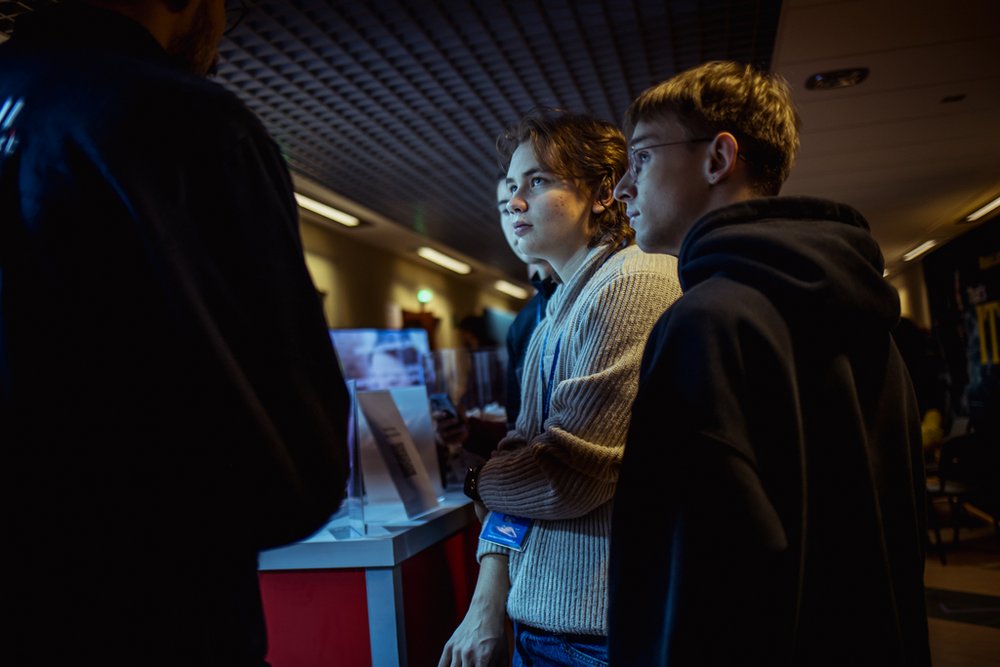 participants of the event visiting exhibitors' stands