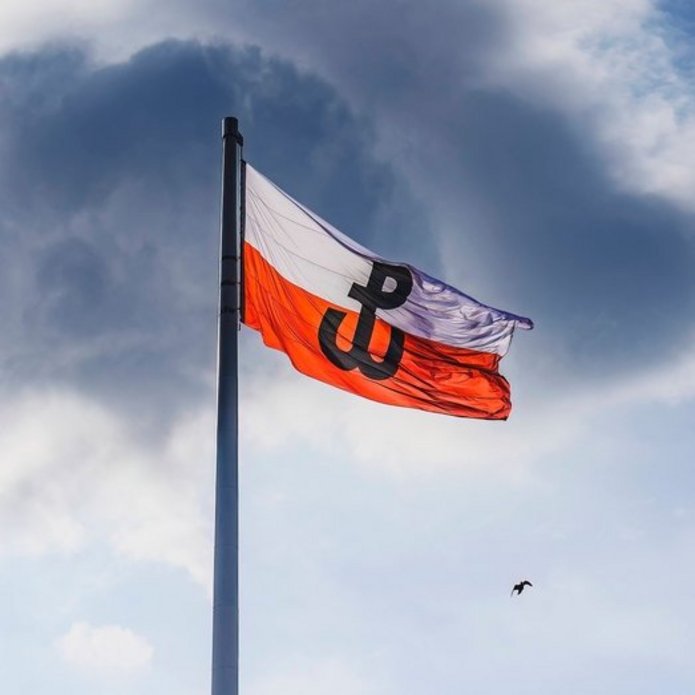 Polish flag with the symbol of the Warsaw Uprising