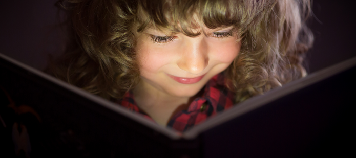 a girl reading a book