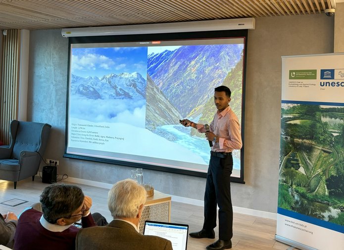 A photo of a person giving a presentation during the seminar