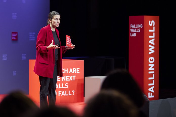 a woman delivering a speech during the competition