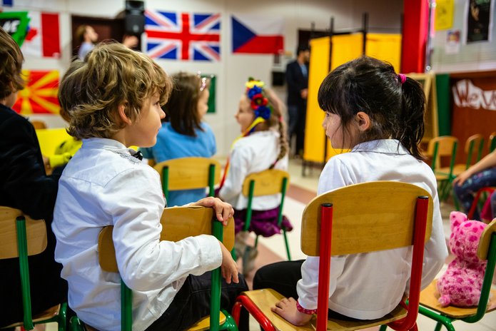 Two children sitting in a classroom