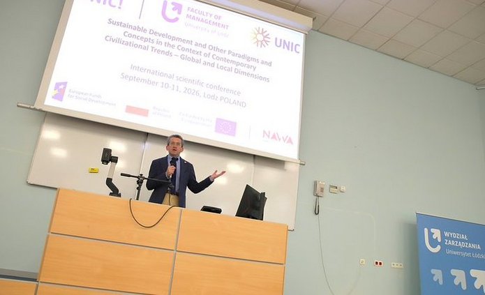 Speaker delivering his presentation at the Assembly Hall