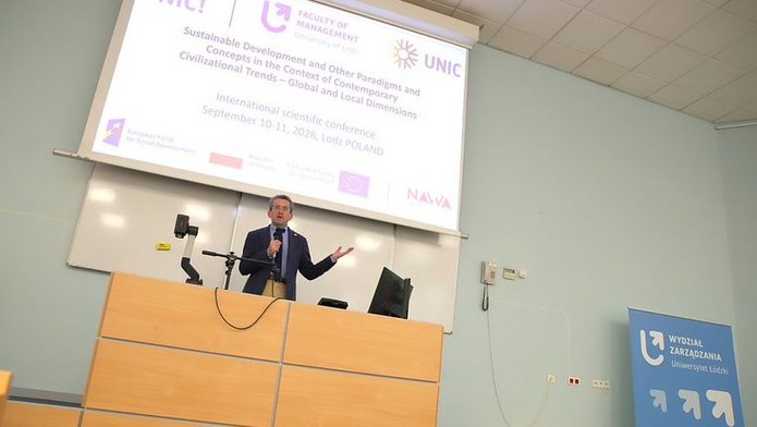 Speaker delivering his presentation at the Assembly Hall