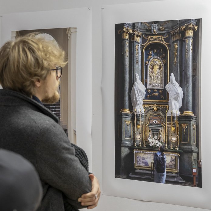 A photo of a person viewing the exhibition