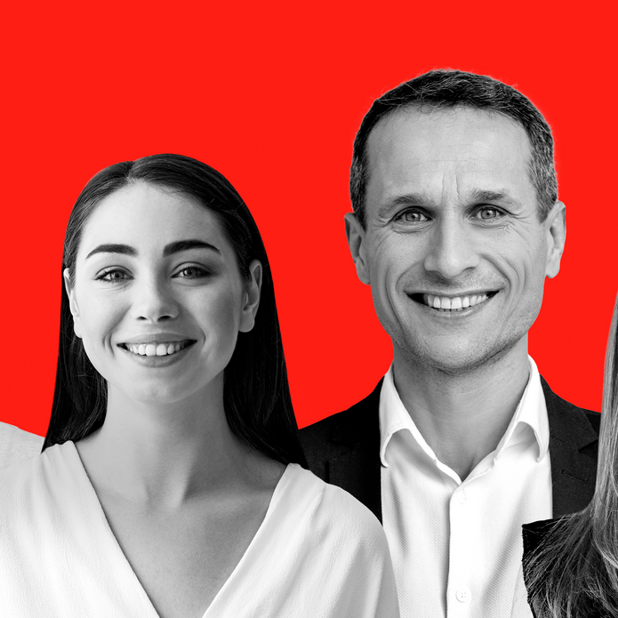 A woman and a man (a mentor and mentee in the VIP Mentorship Project) against a red background