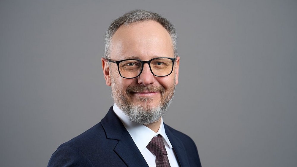 a portrait photo of dr hab. Dominik Lubasz, Associate Professor at the University of Lodz