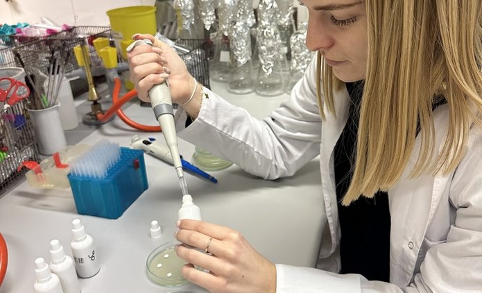 a female student working in a laboratory