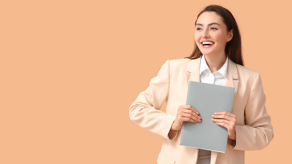 A woman holding documents