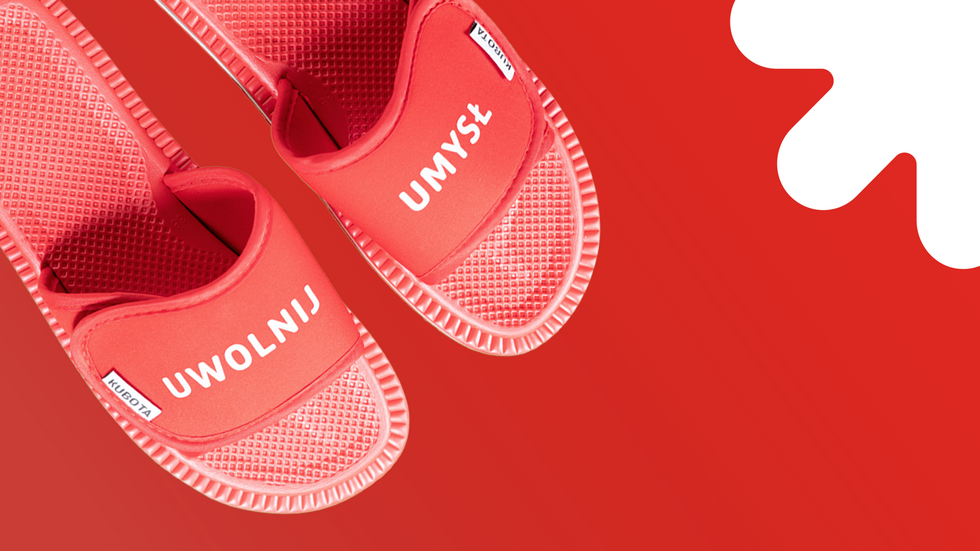 Red Kubota slides with the words "Free Your Mind"