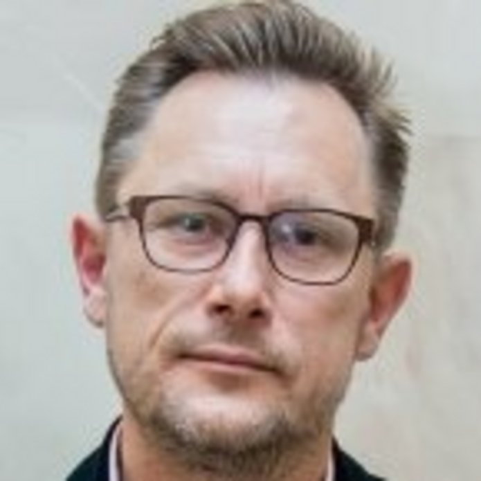 portret Grzegorz Justyński