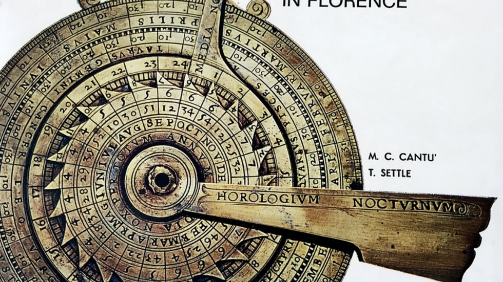 a book cover with an antique musical instrument on it