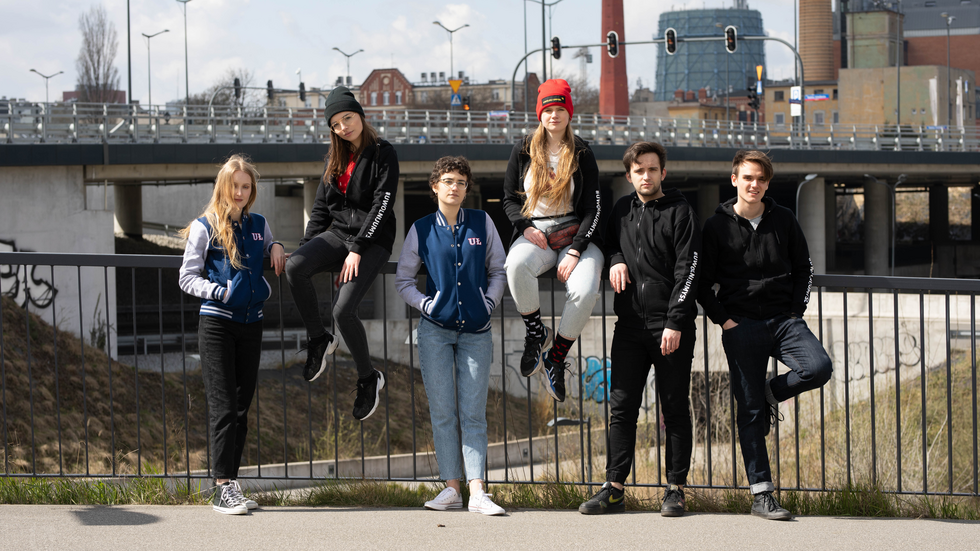 a group of students in an urban space