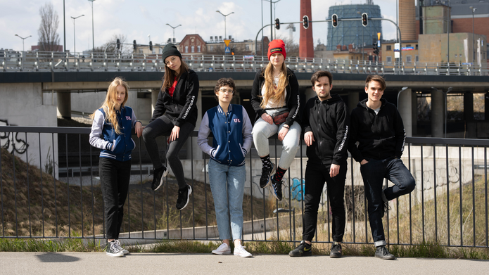 a group of students in an urban space