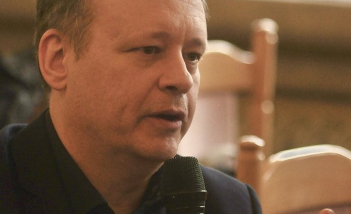 a portrait photo of Dr Majer