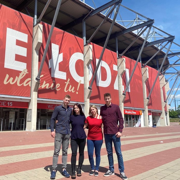 geography students outside the Widzew Łódź stadium