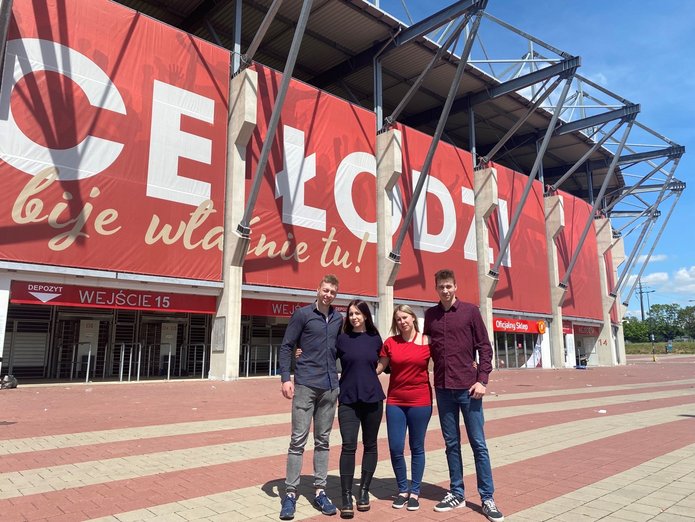 geography students outside the Widzew Łódź stadium
