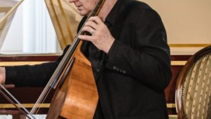 Mark Caudle playing the viola da gamba