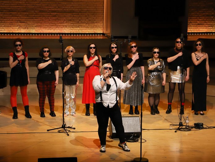 Singing and dancing women who are on stage