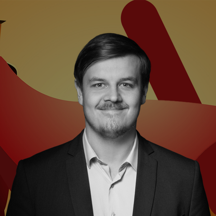 a portrait photo of Dr Jakub Stępień