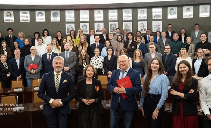  a group of people in an academic hall - 25th Anniversary of the UniLodz Law Clinic