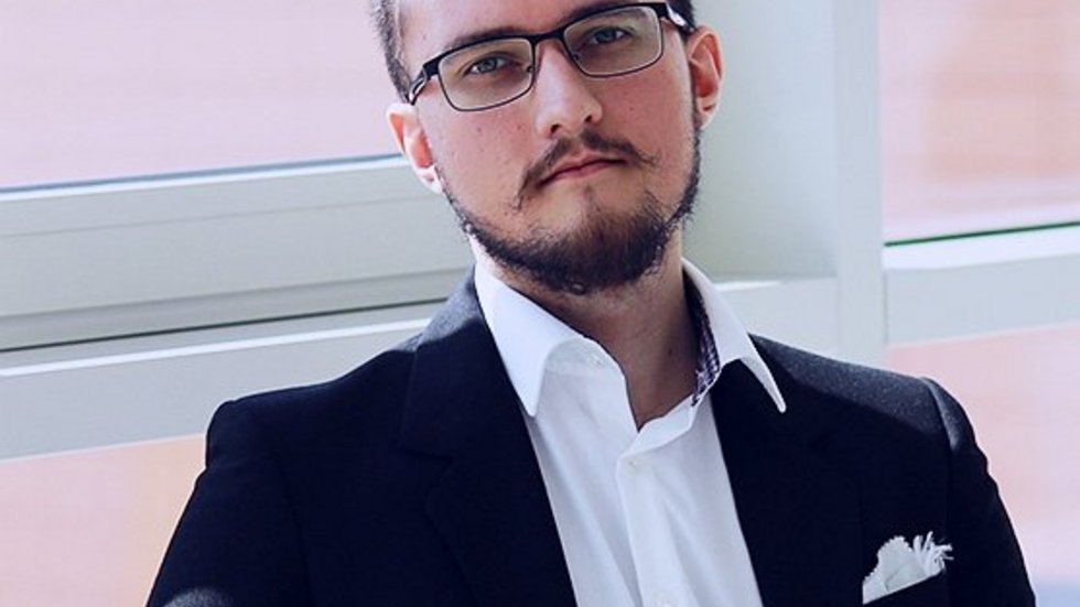 a portrait photo of Krzysztof Hejduk