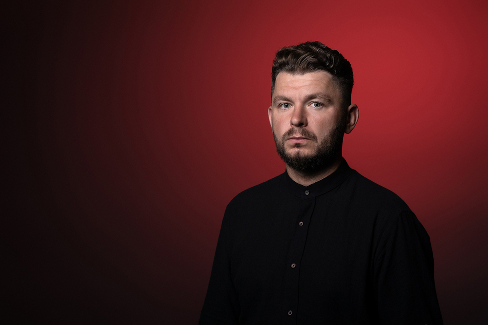 a portrait photo of Dr Dawid Kobiałka