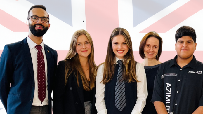 3 women and 2 men from BISUL standing against the background of British flag.