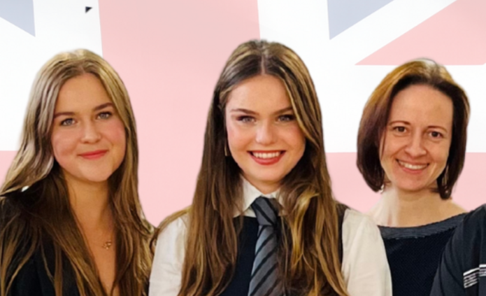 Trzy kobiety i mężczyzna z BISUL stojący na tle flagi brytyjskiej