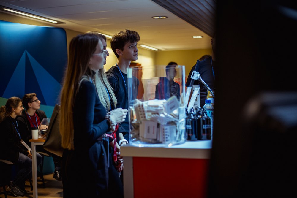participants of the event visiting exhibitors' stands