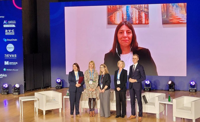 a photo of people participating in the panel