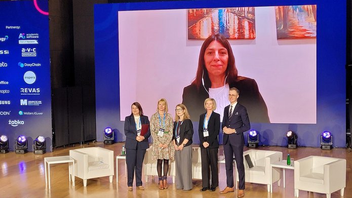 a photo of people participating in the panel