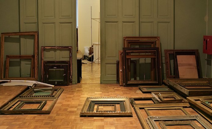 interior of a room with picture frames