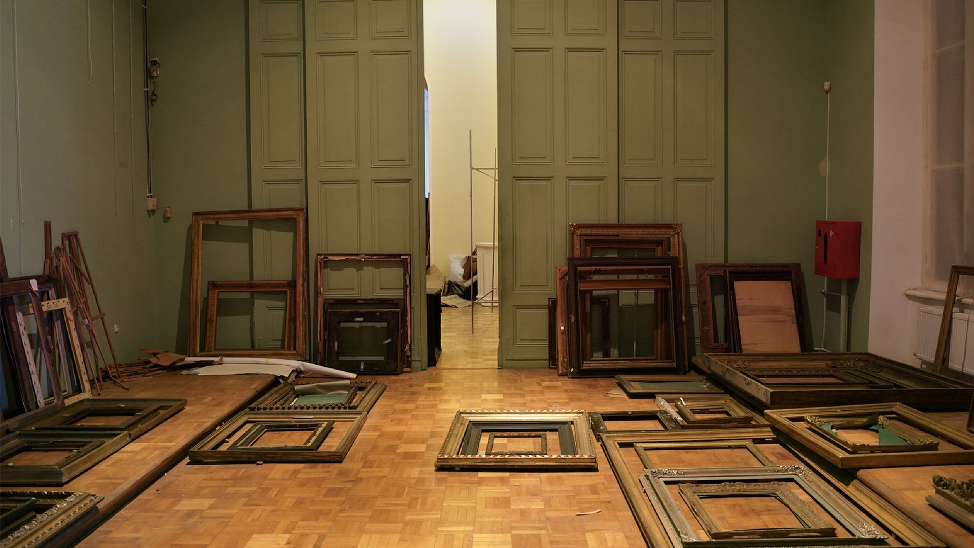 interior of a room with picture frames