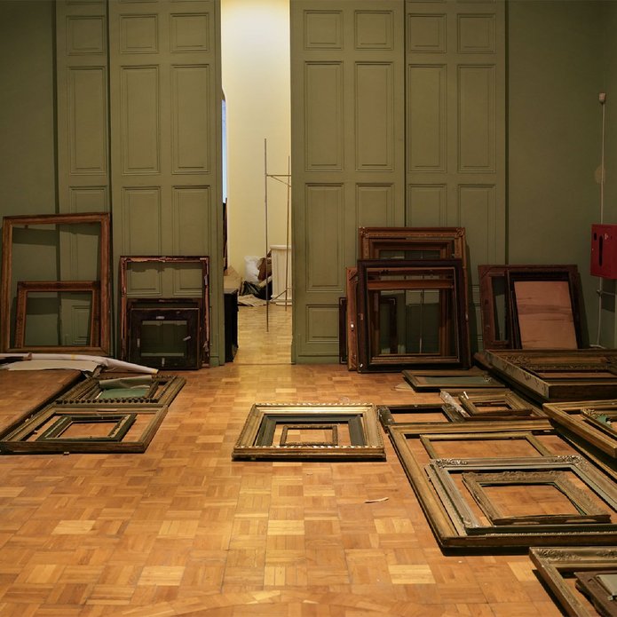 interior of a room with picture frames