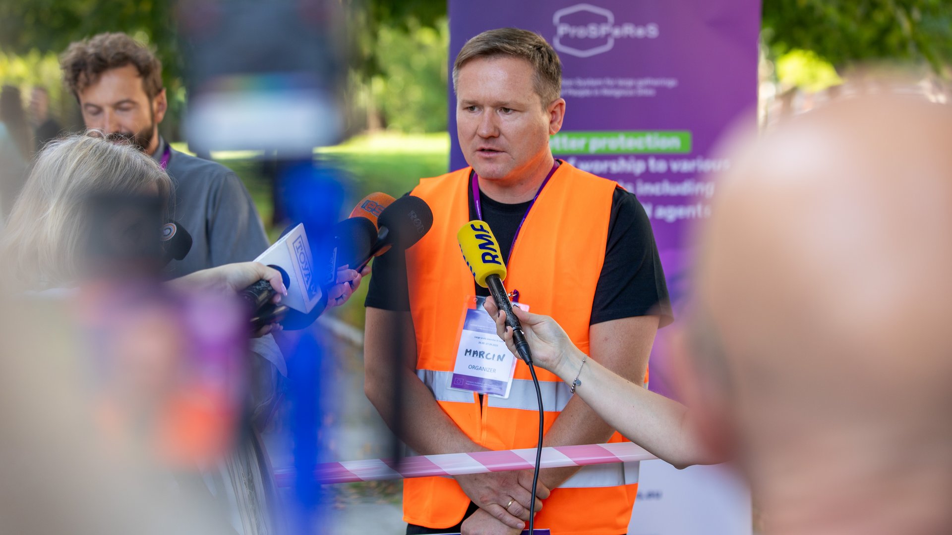 the project manager at a press conference