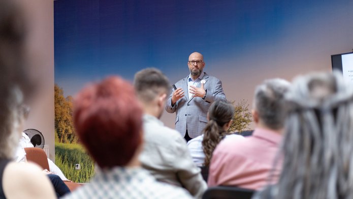 A man delivering a lecture