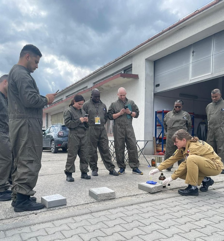 From 18–22 May, the Central School of the State Fire Service in Czestochowa, Poland, hosted an international training course on situation assessment and sampling in areas contaminated with Chemical, Biological, Radiological, and Nuclear (CBRN) agents. The course was organized by the Organisation for the Prohibition of Chemical Weapons (OPCW), recipient of the 2013 Nobel Peace Prize. Our Team Member, Maksymilian Stela, had a honors to be one of the trainers. The training brought together representatives from 18 States Parties to the Chemical Weapons Convention. They were representing military forces, fire and rescue services, police, and civil protection organizations from North and South America, Africa, and Asia. As CBRN threats continue to evolve amid growing geopolitical tensions and the persistent risk of terrorism, enhancing international preparedness and response capabilities remains a global priority. International collaboration, practical expertise, and readiness remain essential pillars of effective CBRN response. This goal is shared by the Biohazard Prevention Centre.