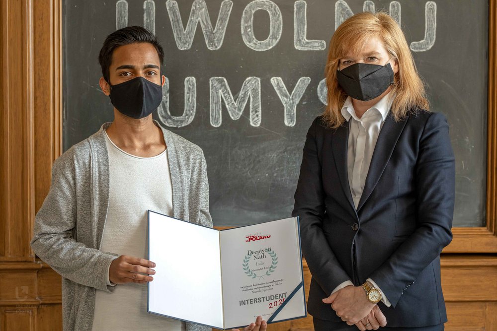 Deepjyoti Nath with the Rector of the University of Lodz