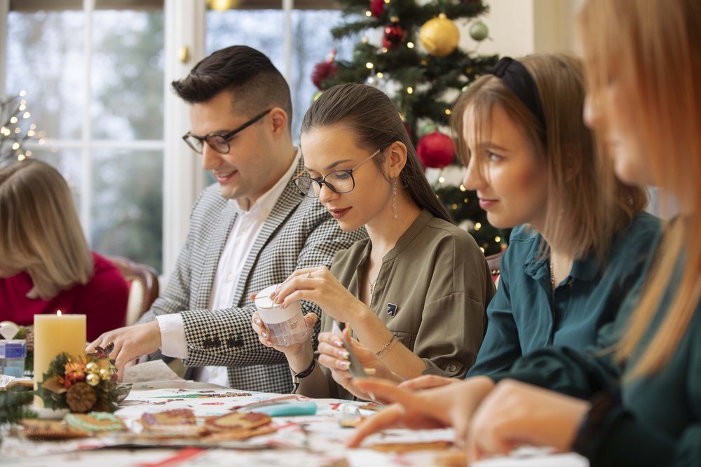 students decorating gingerbread cookies