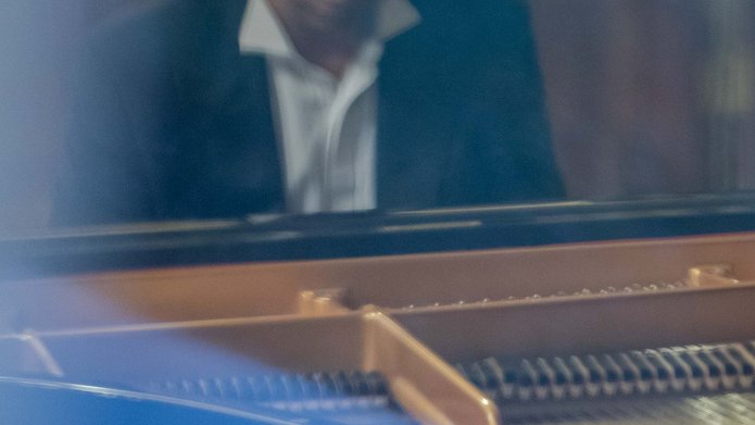 a musician playing the piano