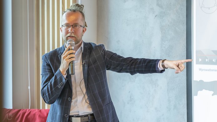 Łukasz Lamża during his presentation