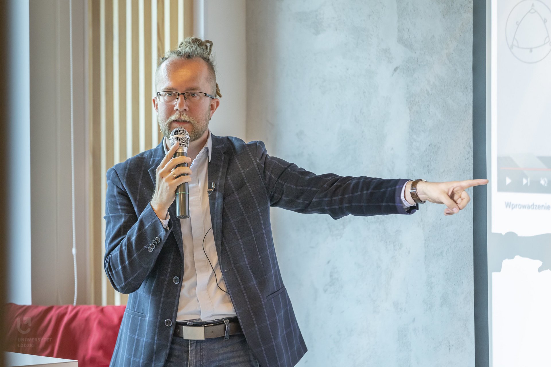 Łukasz Lamża during his presentation