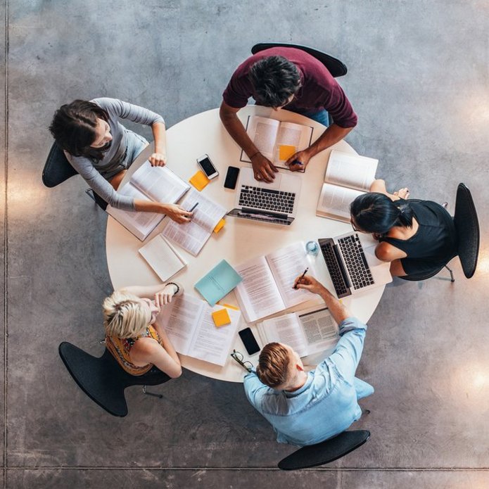 a decorative element: sitting at a table and studying students