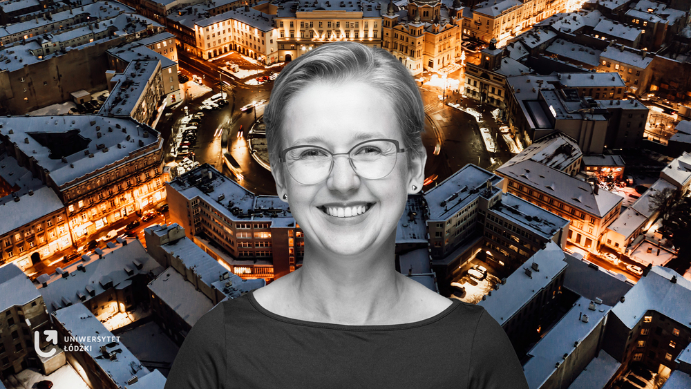 Dr Aleksandra Mroczek-Żulicka on the background of the Freedom Square in Lodz seen from a bird's eye view at night in winter weather with snow on the roofs of buildings